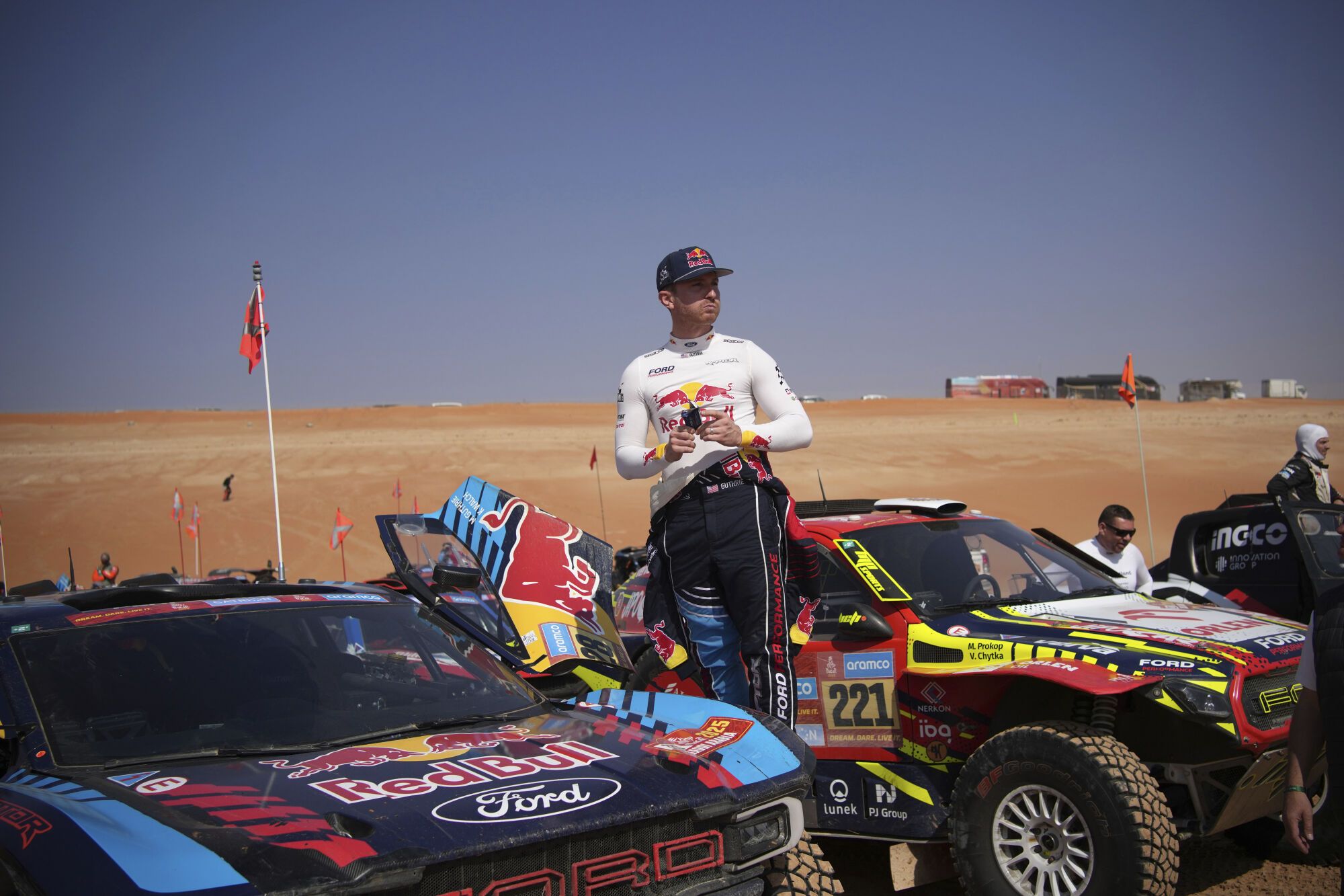 Driver Mitchell Guthrie waits at the start delayed due to fog during the eleventh stage of the Dakar Rally with start and finish in Shubaytah, Saudi Arabia, Thursday, Jan. 16, 2025. (AP Photo/Christophe Ena)