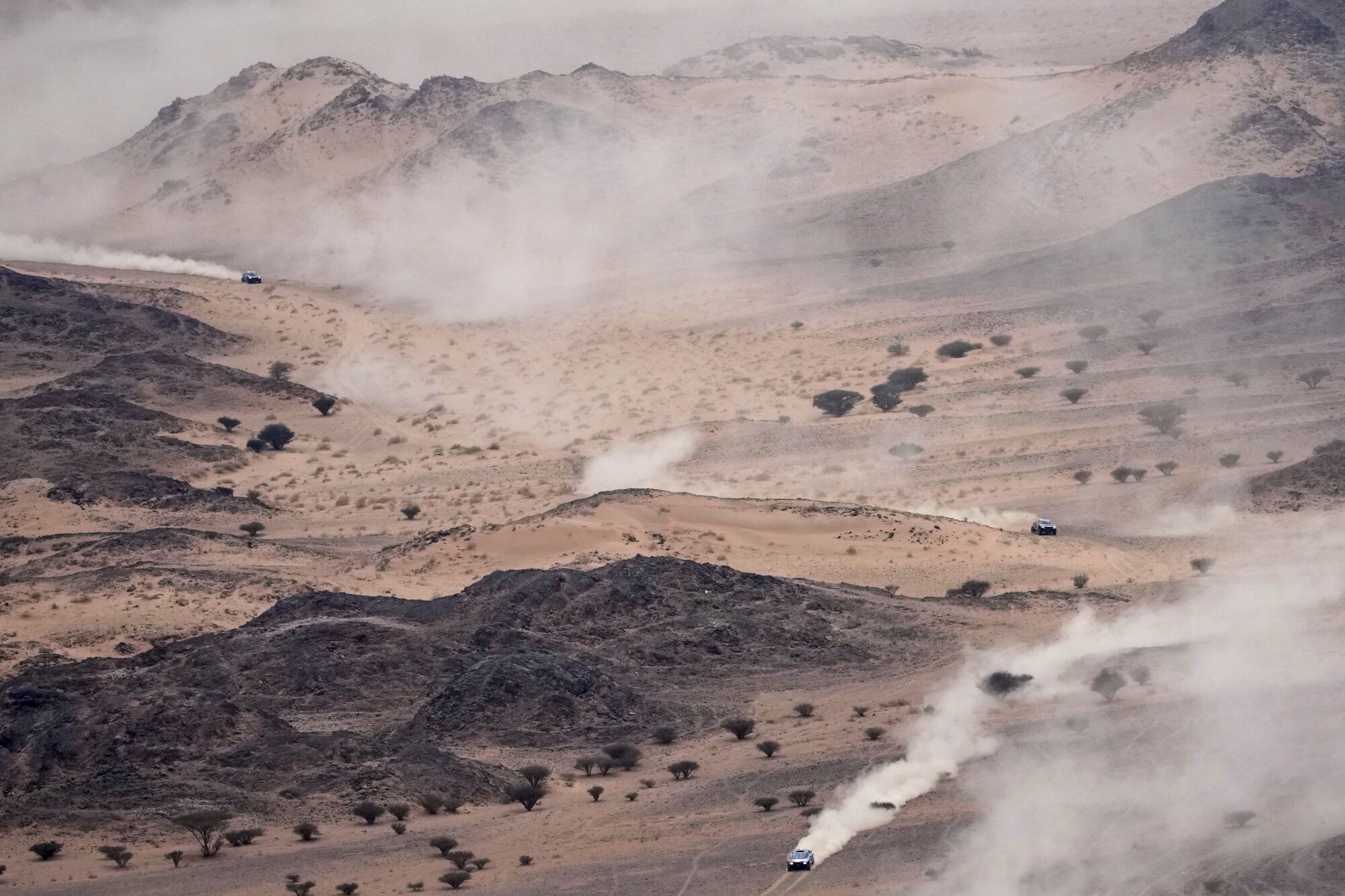 Cars drive during the seventh stage of the Dakar Rally with start and finish in Al Duwadimi, Saudi Arabia, Sunday, Jan. 12, 2025. (AP Photo/Christophe Ena) Associated Press/LaPresse. EDITORIAL USE ONLY/ONLY ITALY AND SPAIN